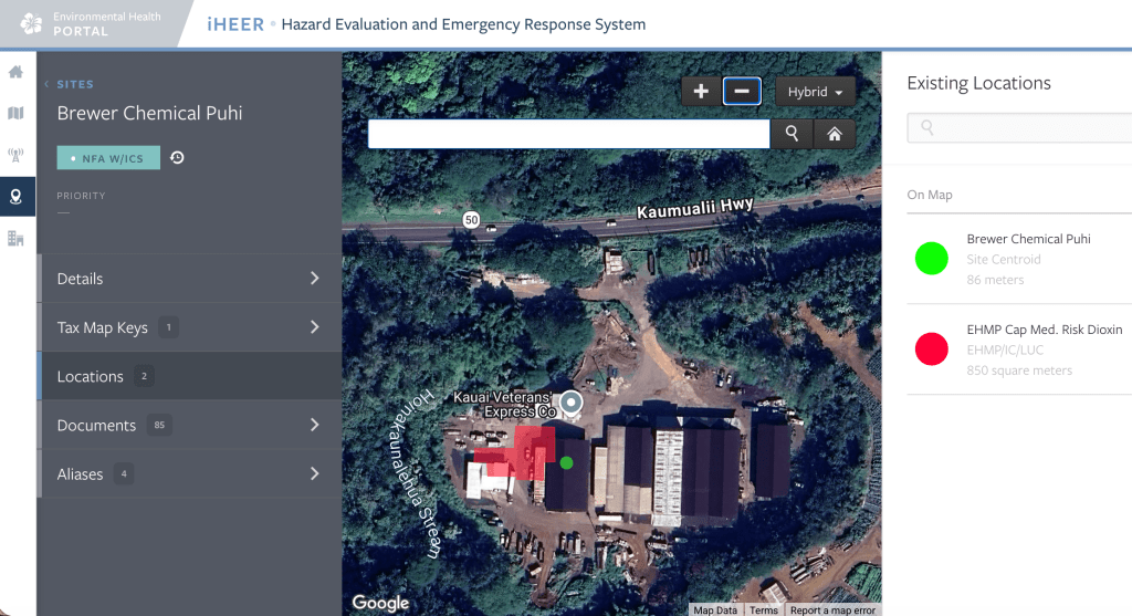An aerial photograph of an industrial parcel on Kaua‘i with a red area. 