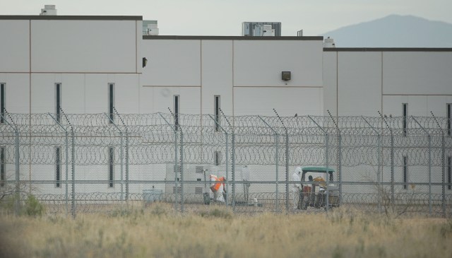 Saguaro Correctional Facility. People walking around inside of fences. Eloy, Arizona 6 march 2016. photograph Cory Lum/Civil Beat