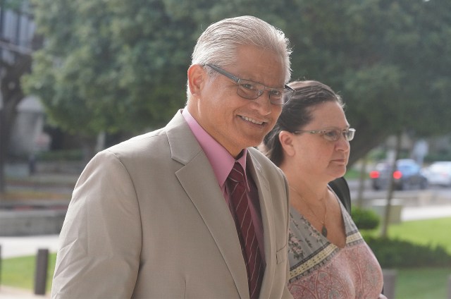 Former HPD Chief Louis Kealoha and Katherine Kealoha arrive at District Court.