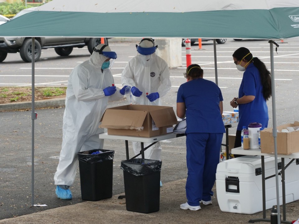 Volunteers and Honolulu city workers teamed up on Saturday to help distribute free COVID-19 testing to community members working in high risk professions or those exhibiting symptoms. 