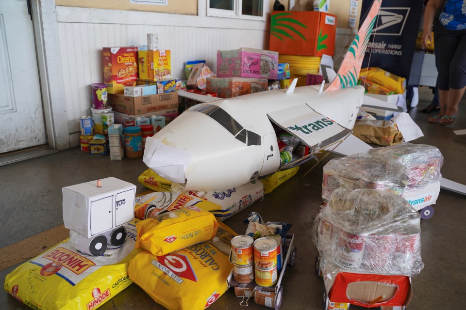 Transair, one of the state’s largest air cargo companies, is donating $20,000 and canned goods throughout the state. Transair employees were encouraged to build creative depositories for the canned goods donated. More than 3,000 pounds of rice, noodles and canned goods were donated by Transair employees. Donations were accepted in Honolulu, Hilo, Kona, Maui and Kauai.