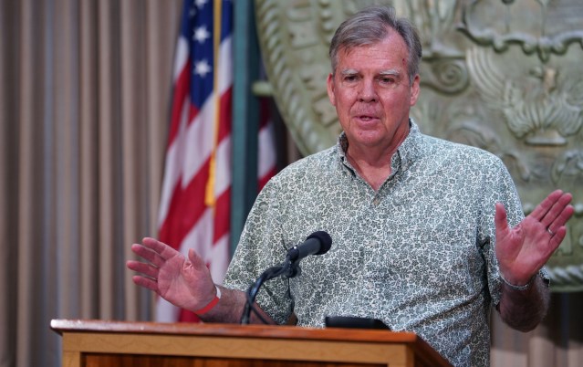 Department of Health Director, Dr. Bruce Anderson gestures during press conference on COVID-19 at the Capitol.