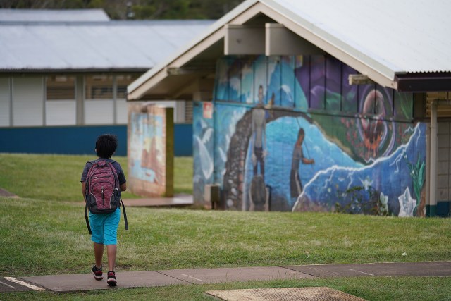 Lanai High and Elementary School student walks to his class on the elementary school side of campus.
