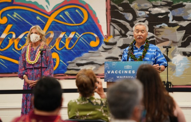Governor David Ige gives some remarks before First Lady Dr. Jill Biden is introduced to speak at Waipahu High School library.