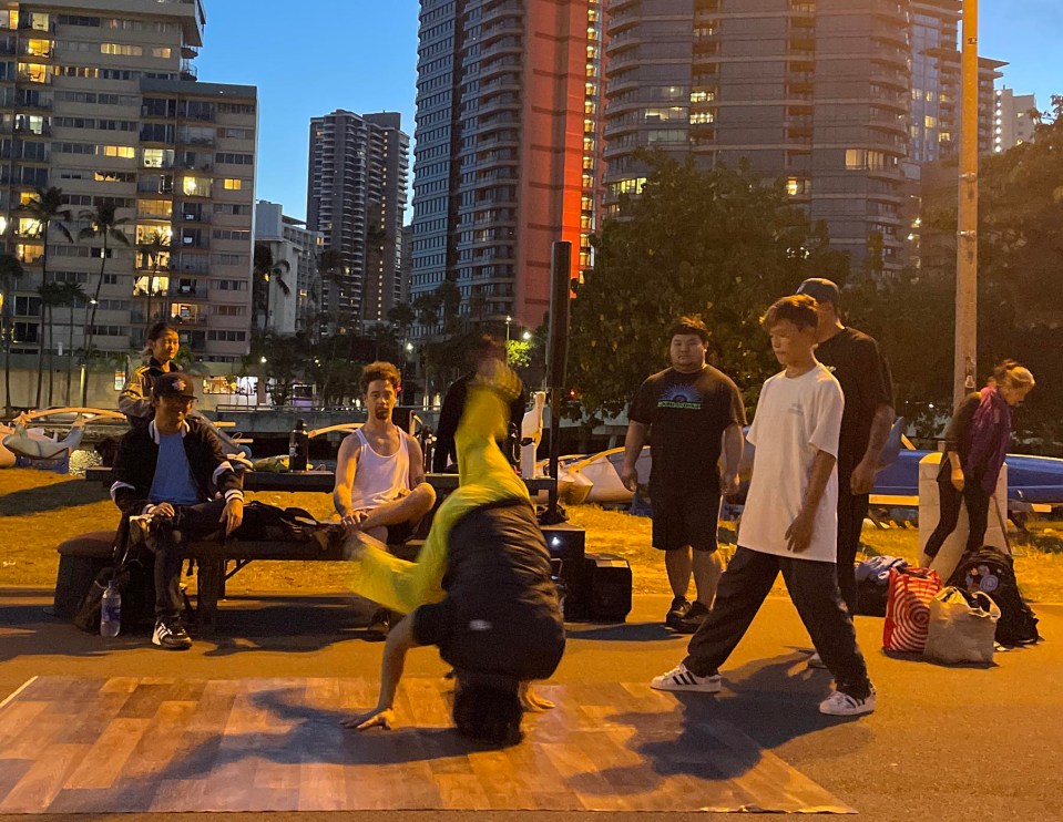 Break dancing enthusiasts of all ages come together to share dance moves with one another at the Ala Wai Park in Honolulu, Thursday, October 14, 2021. (Ronen Zilberman photo Civil Beat)