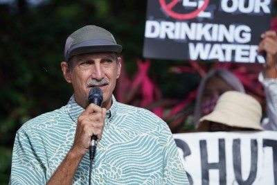 Gary Gill speaks to demonstrators about the US Navy fuel spill and demands the fuel tanks be removed immediately at the Federal Building.