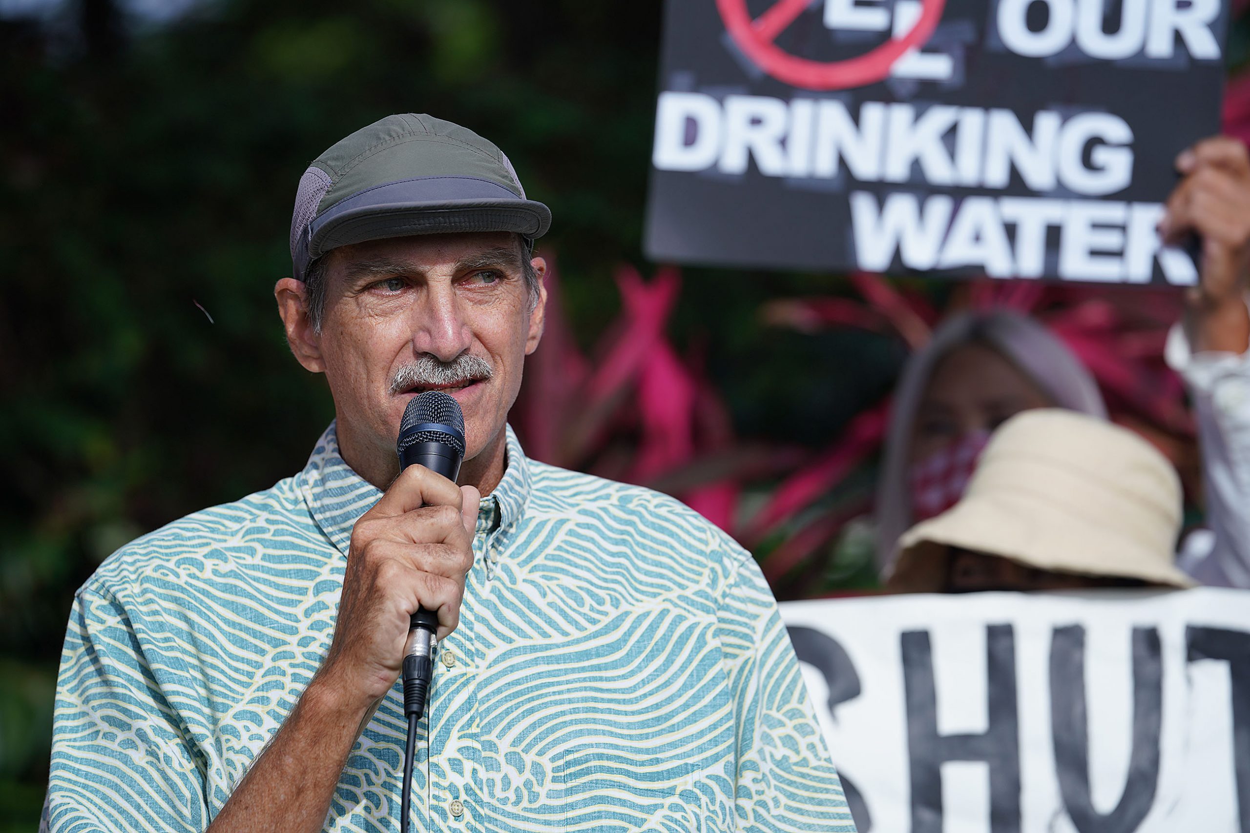 Gary Gill speaks to demonstrators about the US Navy fuel spill and demands the fuel tanks be removed immediately at the Federal Building.