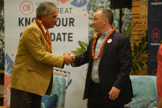 Gubernatorial candidates Duke Aiona and Josh Green shake hands after the Honolulu Civil Beat 'Know your candidate' event held at the Waiwai Collective.