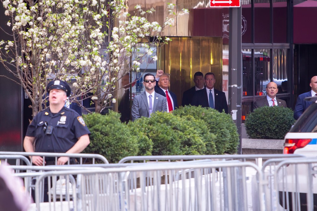 President Trump Giving Solidarity Fist before leaving Trump Town for arraignment