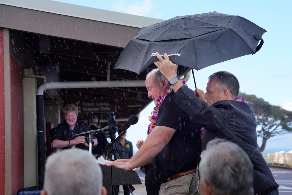 Gov. JosGov. Josh Green and Bob Fenton, the chief federal response coordinator for FEMA, were among the many officials to weigh in on the reopening of schools in Lahaina. (Kevin Fujii/Civil Beat/2023)h Green has Bob Fenton’s back while he addresses the media about the Federal Emergency Management Agency’s participation to reopen schools in West Maui on Tuesday, Sept. 26, 2023, at Kapalua Airport in Lahaina. Fenton is the chief federal response coordinator for FEMA, The Army Corps of Engineers will be building a temporary replacement school for King Kamehameha III Elementary. (Kevin Fujii/Civil Beat/2023)