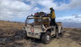 A picture of a Vietnam-era Gama Goat, a small truck-like vehicle, that are good for off-road use but difficult to maintain. The gama-goat is obviously old.
