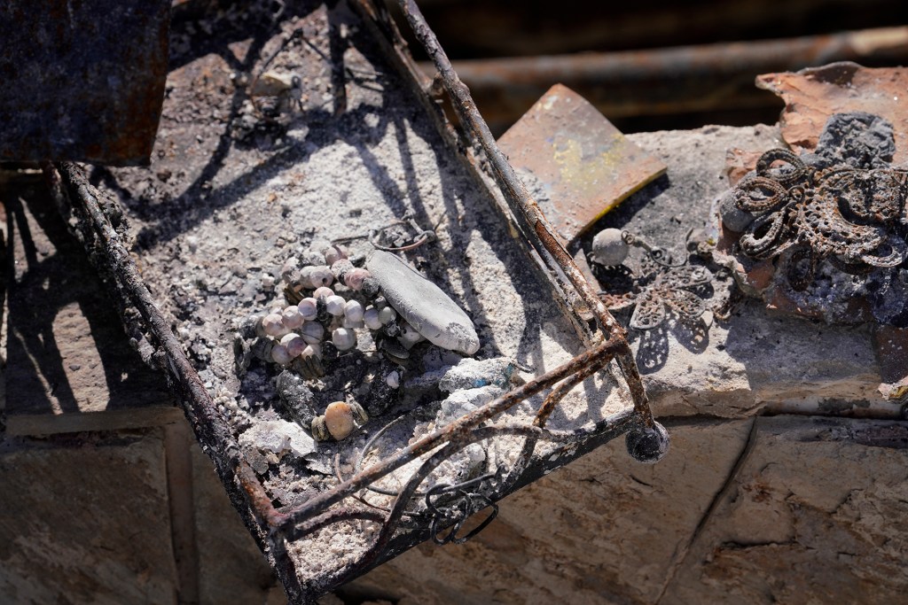 U’i Kahue-Cabanting found some of her jewelry in the area of her bathroomome returning residents were able to find small items that have become emotional keepsakes as they rebuild their lives. (Kevin Fujii/Civil Beat/2023)