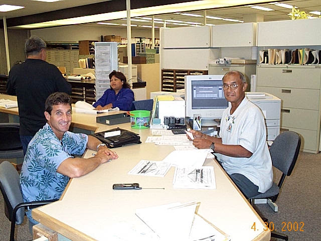 Years ago, at the Honolulu Department of Planning and Permitting, applicants used to be able to come in, ask plans examiners questions, and correct their plans on the spot. Today, correspondence is digital and takes much longer, applicants, say. (DPP archival photo/2002)