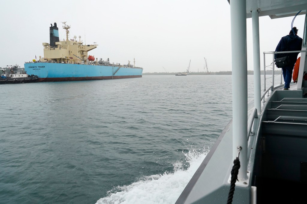 The tanker Yosemite Trader gets under way Wednesday, Dec. 20, 2023, from Joint Base Pearl Harbor-Hickam in Honolulu. It’s transporting fuel drained from the Red Hill Bulk Fuel Storage Facility to the Philippines. Defueling began Oct. 16 and removed approximately 104,642,160 gallons of fuel. Gravity based defueling has been completed six months ahead of schedule. (Kevin Fujii/Civil Beat/2023)