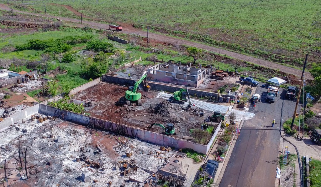 Contractors for the U.S. Army Corps of Engineers are clearing a property in the northern section of the Lahaina burn zone. (Cammy Clark/Civil Beat/2024)
