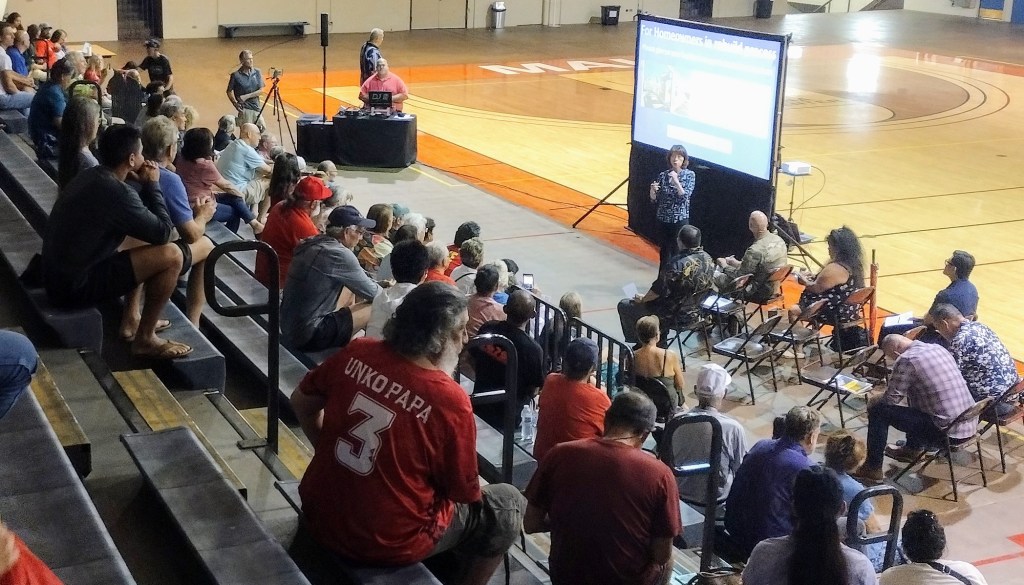 Maui County Public Affairs Director Mahina Martin led the community update meeting at Lahaina Gym Aug. 18. (Leo Azambuja/Civil Beat/2024)