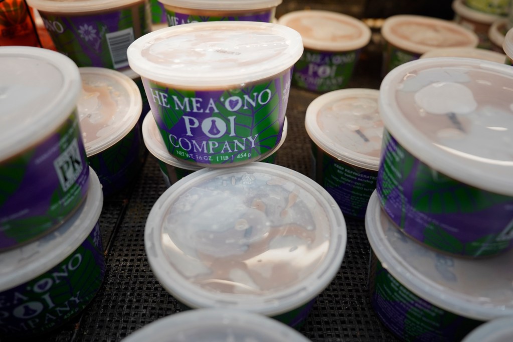 Pomai Kulolo’s He Mea Ono Poi is for sale at Times Supermarket Friday, Oct. 11, 2024, in Waipahu. The price of kalo has gone up. Some local poi makers are importing kalo to keep prices down. (Kevin Fujii/Civil Beat/2024)