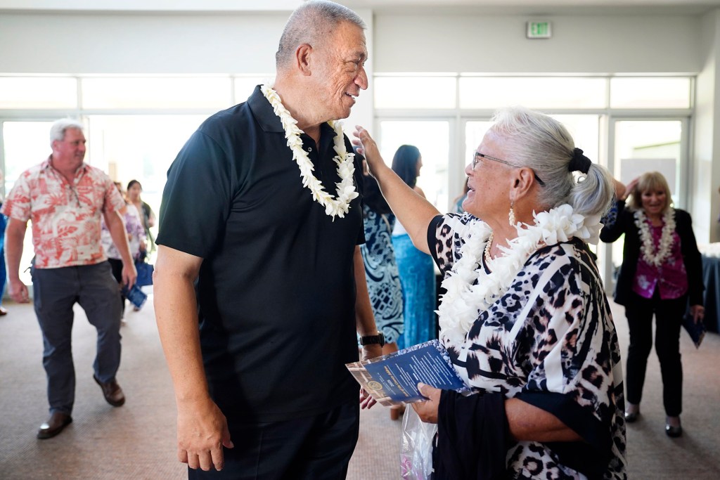Maui Mayor Richard Bissen receives a lei from Aunty Mopsy Aarona before delivering the state of the county address Friday, March 7, 2025, in Kahului. (Kevin Fujii/Civil Beat/2025)