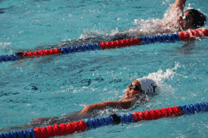 Carrying The Torch For A Hawaiʻi Swim Coach Legend